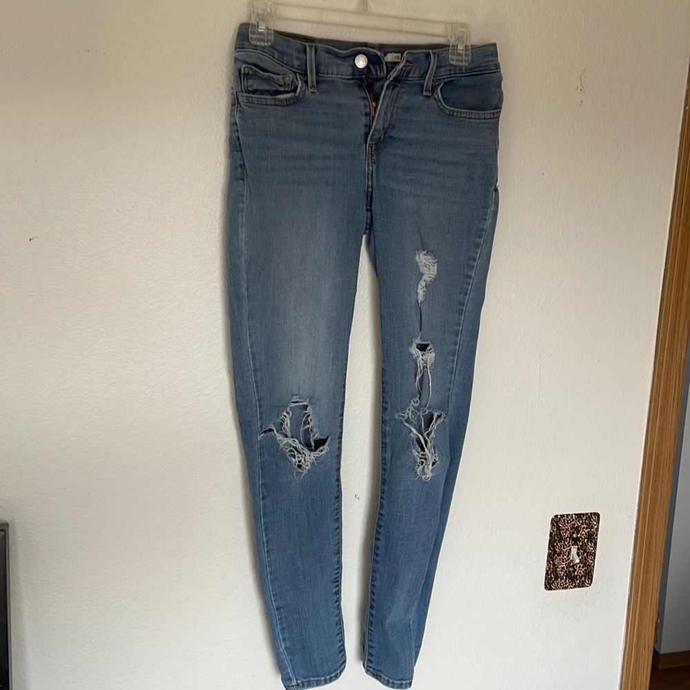 Levi’s 710 distressed super skinny jeans